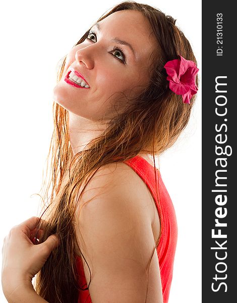 Russian woman laughing with a flower in long hair on a white background. Russian woman laughing with a flower in long hair on a white background