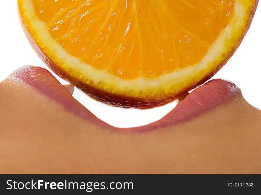 Female Mouth With Orange Slice