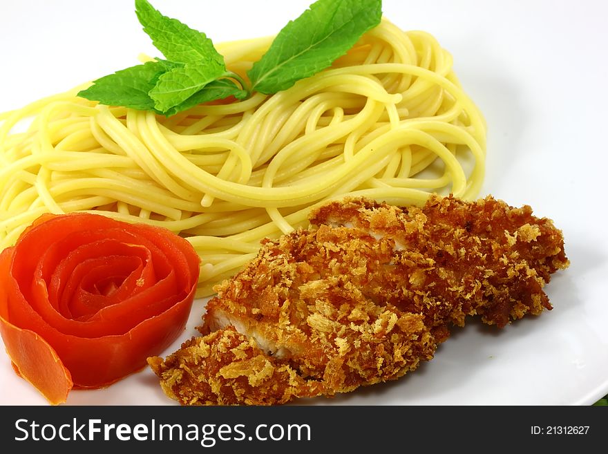 The spaghetti chicken with on the dish