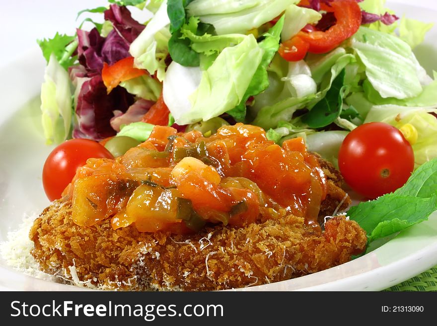 Salad chicken with the sauce from tomatoes in the dish