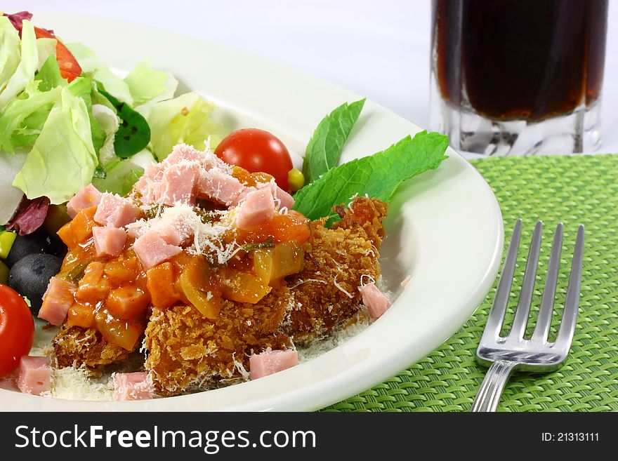 Salad chicken with the sauce from tomatoes in the dish
