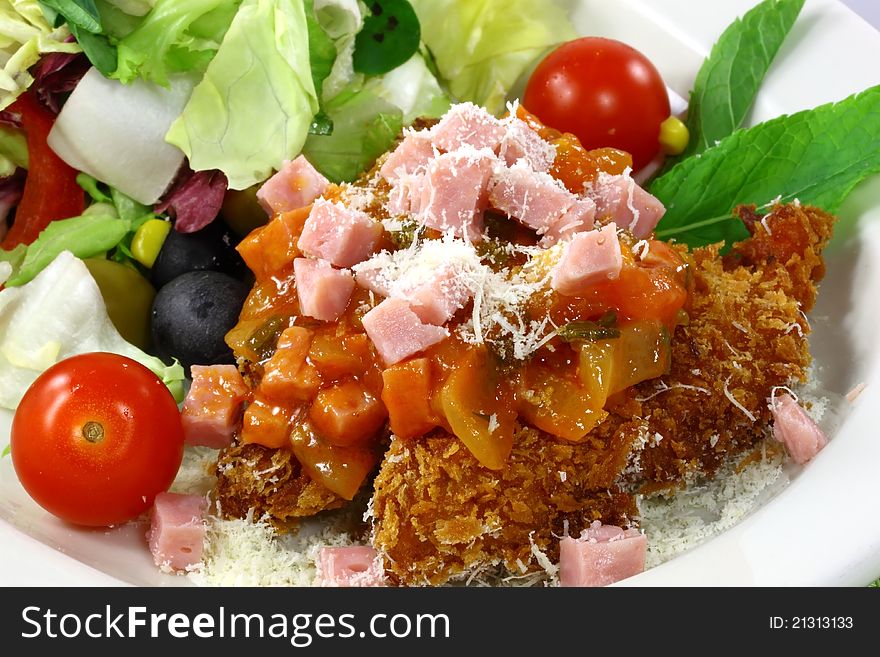 Salad chicken with the sauce from tomatoes in the dish