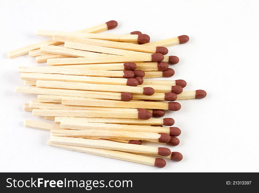 Pile of matches on white background