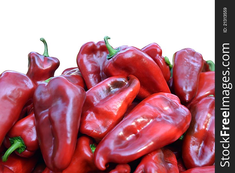 Fresh red peppers with the water drops isolated on white. Fresh red peppers with the water drops isolated on white