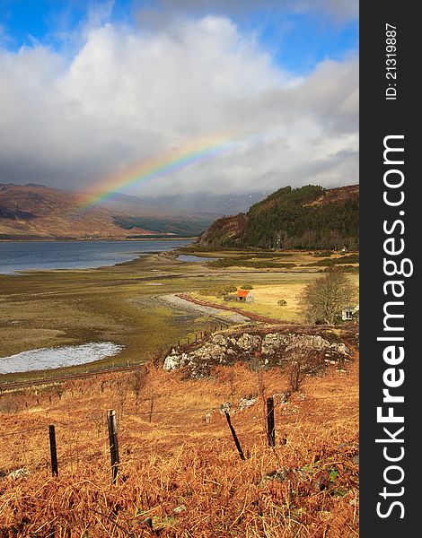 A beautiful rainbow across a valley in the Scottish Highlands