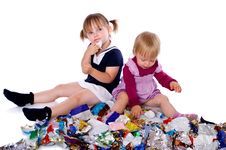 Two Little Girls In Candy Wrappers Royalty Free Stock Photography Two Little Girls In Candy Wrappers Royalty Free Stock Photography