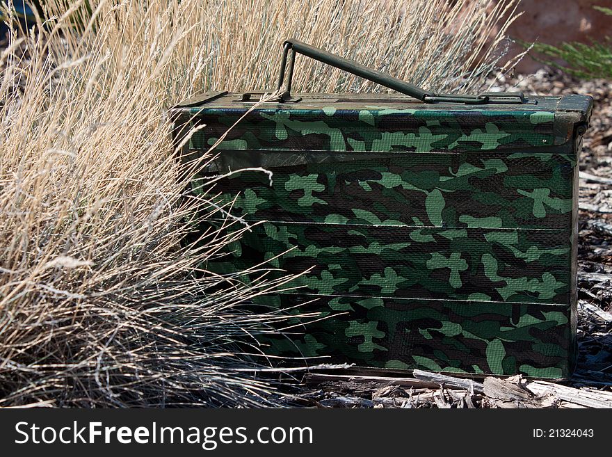 Close-up image of a geocache ammo can hide