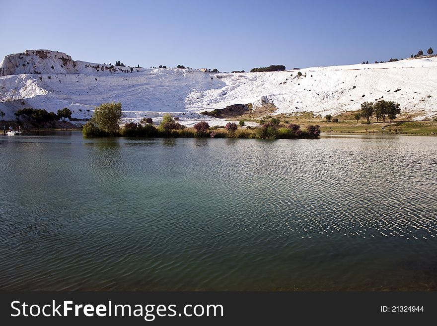 Lake and travertine terraces in Pamukkale, Turkey