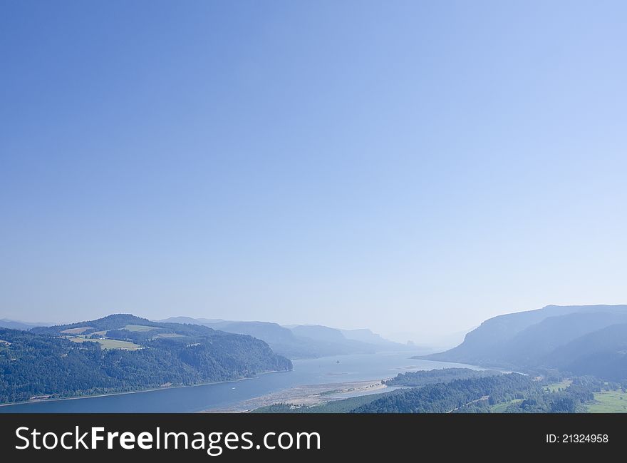 Columbia River Gorge and light blue sky. Columbia River Gorge and light blue sky.