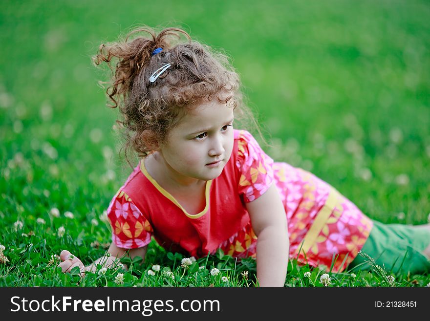 Cute little girl on the meadow in spring day. Cute little girl on the meadow in spring day