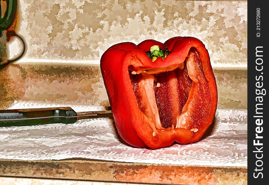 A cup red pepper in a kitchen counter being prepped for cooking.