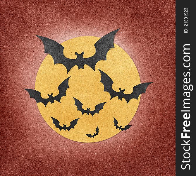 Halloween bat and full moon recycled papercraft background. Halloween bat and full moon recycled papercraft background
