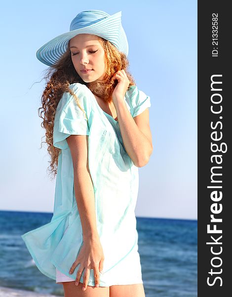 Young attractive woman on sea background. Young attractive woman on sea background