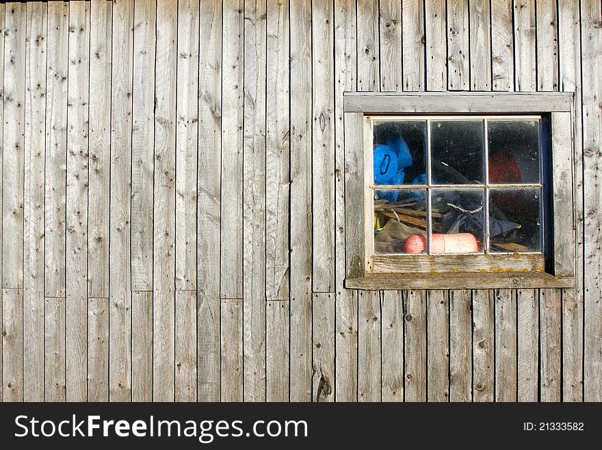Window on a fishing shack in Prince Edward Island