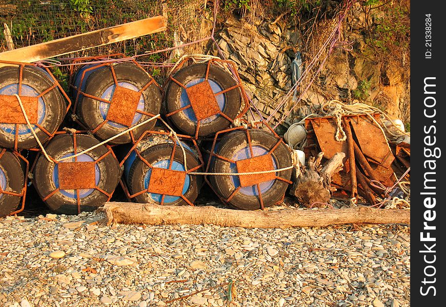 Marine buoys in stock on the shore