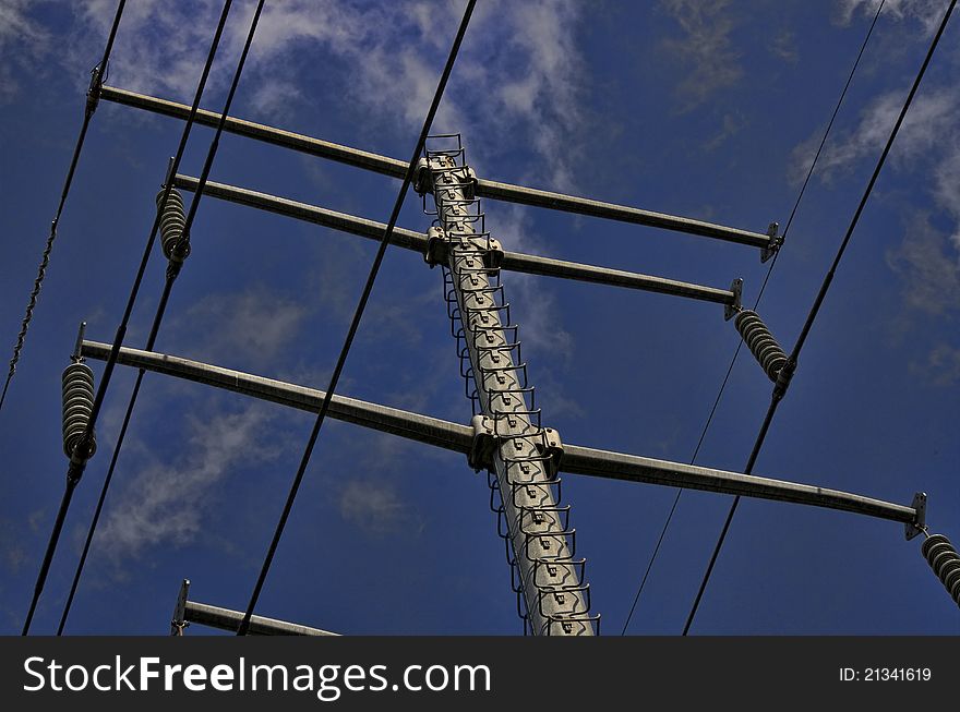 Power Line Tower against blue sky with clouds. Power Line Tower against blue sky with clouds