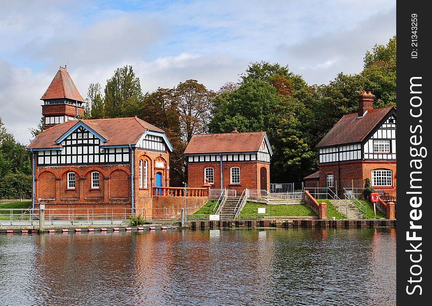 Red Brick water treatment building on the Banks of the River Thames in England. Red Brick water treatment building on the Banks of the River Thames in England