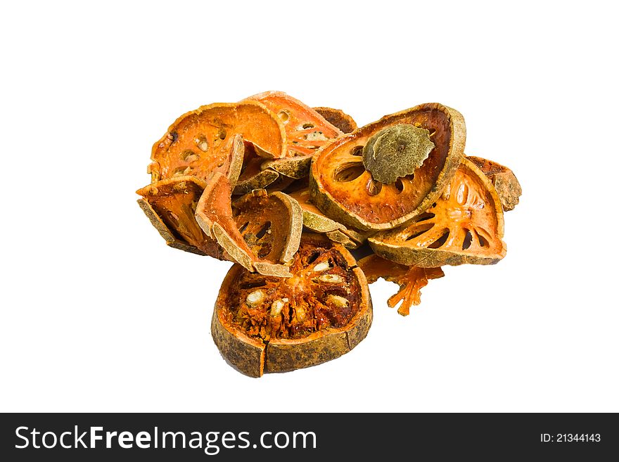 A Slices of dried bael fruit on white background