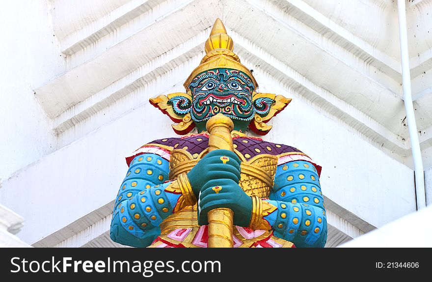 Giant guardians on base of pagoda, Thailand