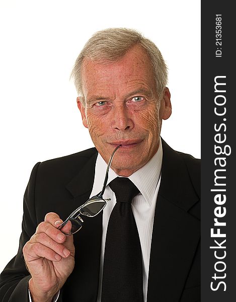 Business man in black suit over a white background