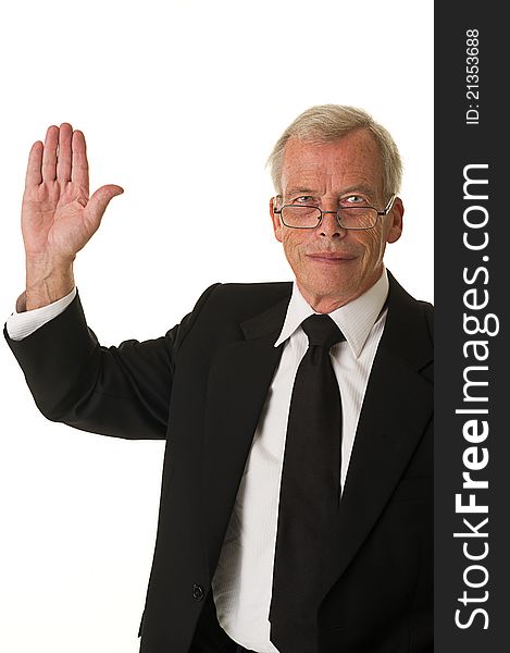 Business man in black suit doing the high five. Over a white background. Business man in black suit doing the high five. Over a white background