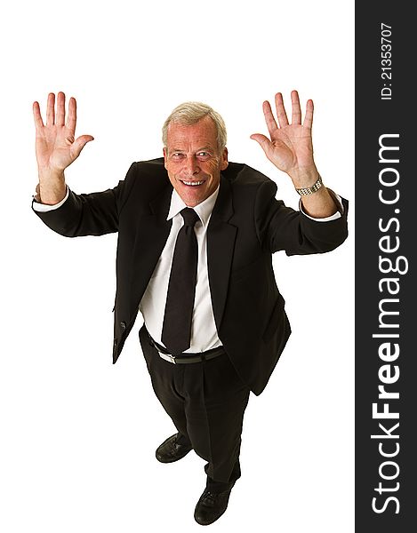 Happy business man in black suit celebrating over a white background