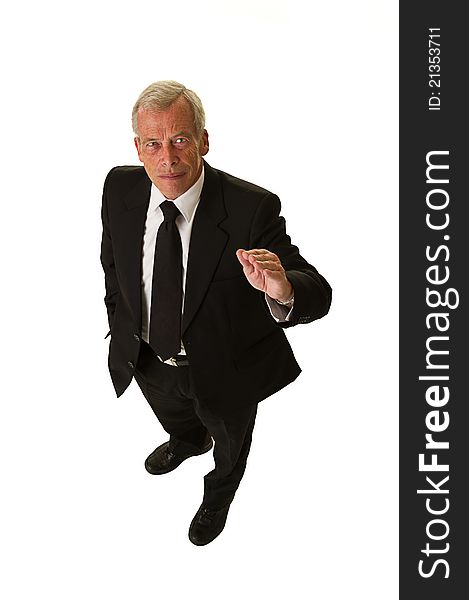 Business man in black suit over a white background