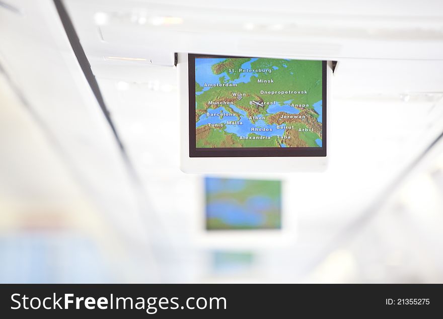 A tv screen with gps signal on plane. A tv screen with gps signal on plane