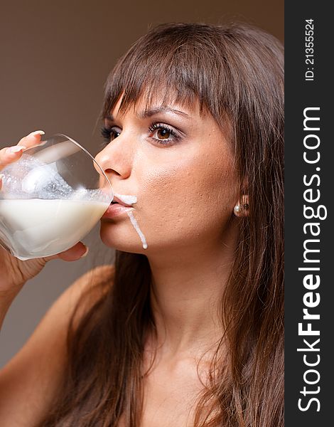 Portrait of beautiful woman drinking milk. Portrait of beautiful woman drinking milk