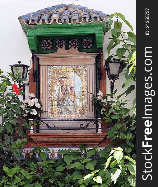 Traditional catholic Religious shrine in Spain with Mother Mary and Jesus in mosaic. Traditional catholic Religious shrine in Spain with Mother Mary and Jesus in mosaic.