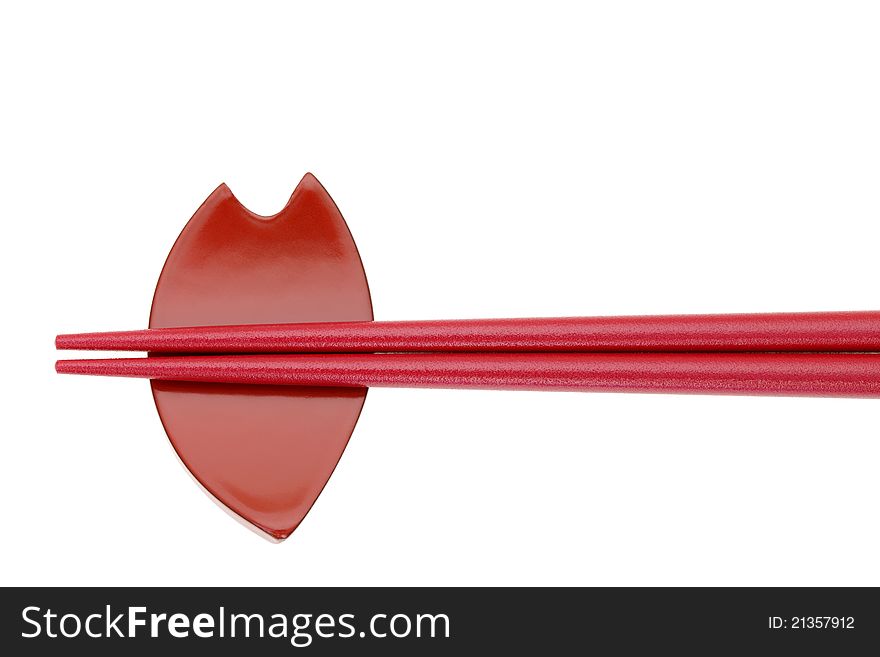 Chopstick and chopstick-rest isolated on a white background