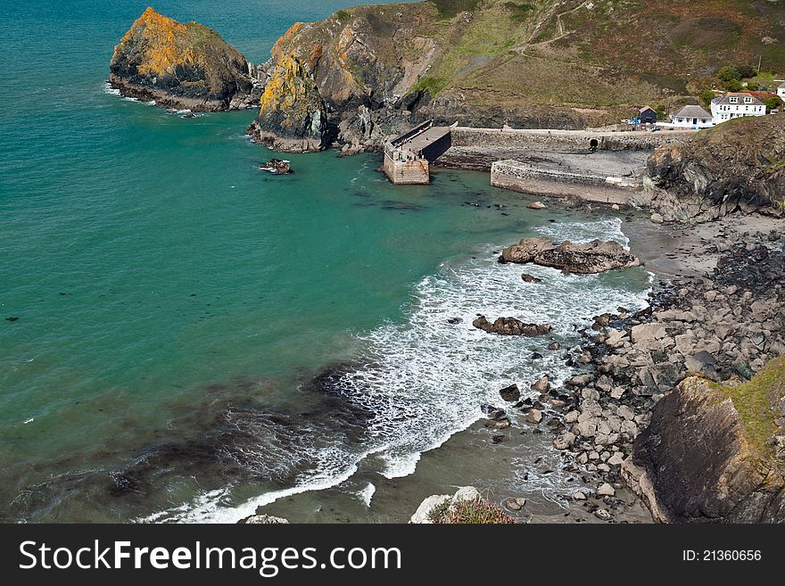 Mullion Cove harbor in Cornwall at low tide. Mullion Cove harbor in Cornwall at low tide