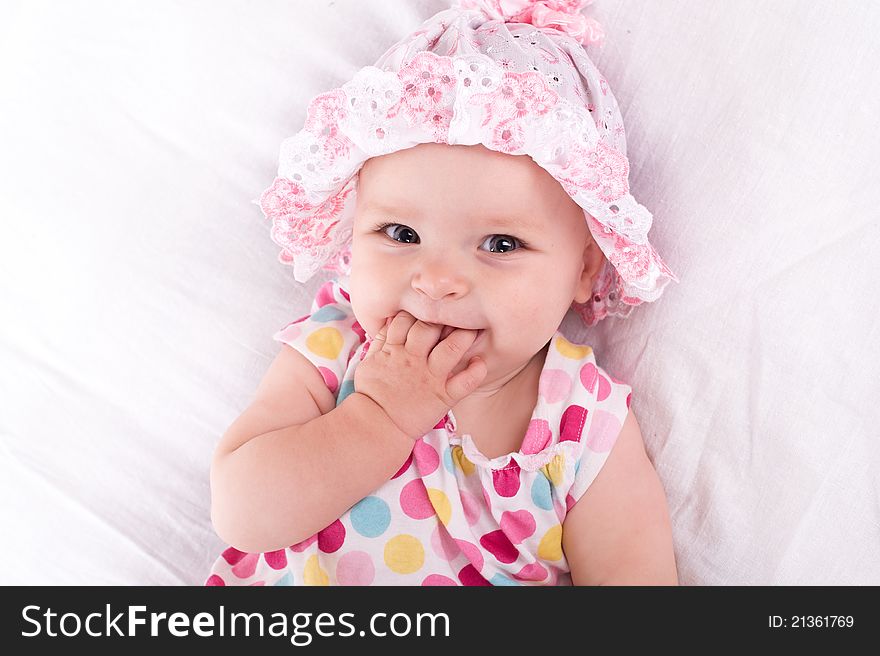 Portrait of a baby girl  on a white background