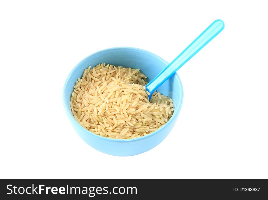 Brown rice in blue bowl.