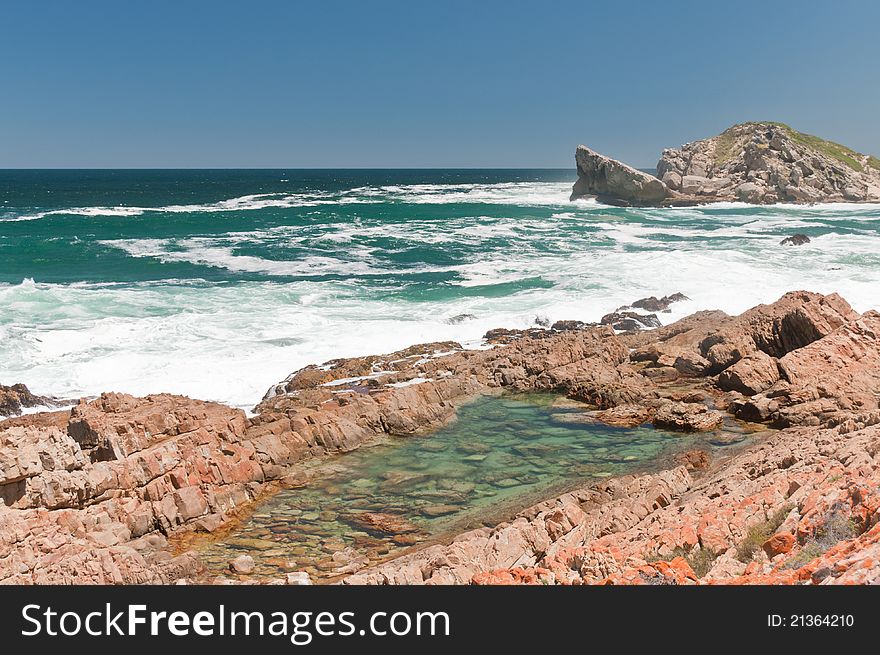 The view of the waves washing over the rocks, Robberg, South Africa. The view of the waves washing over the rocks, Robberg, South Africa