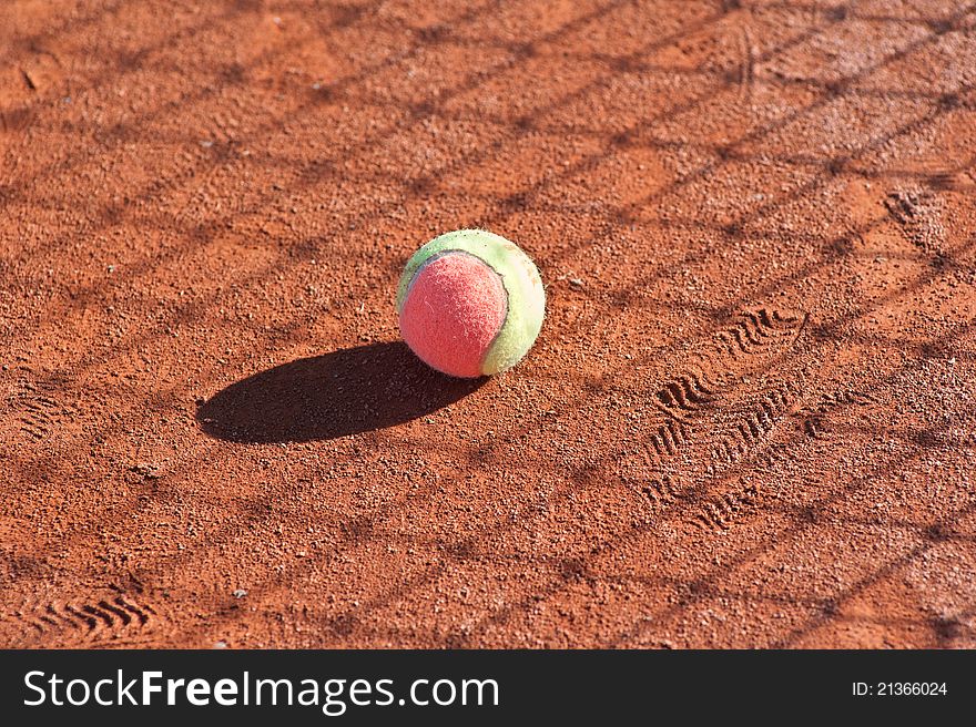 Detail of a clay court with tennis balls