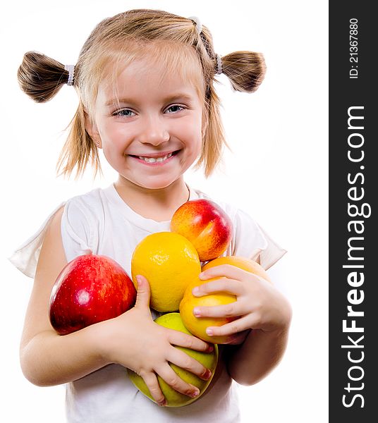 Cute little girl with fruits isolated on a white background