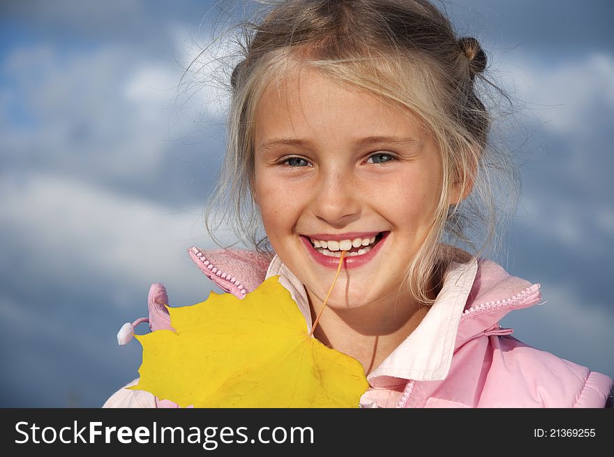 Little girl with yellow leave. Little girl with yellow leave