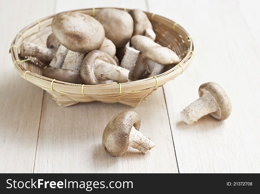 Fresh mushrooms on a wooden board