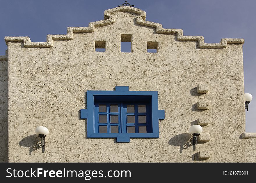 A small window in Greek style. A small window in Greek style