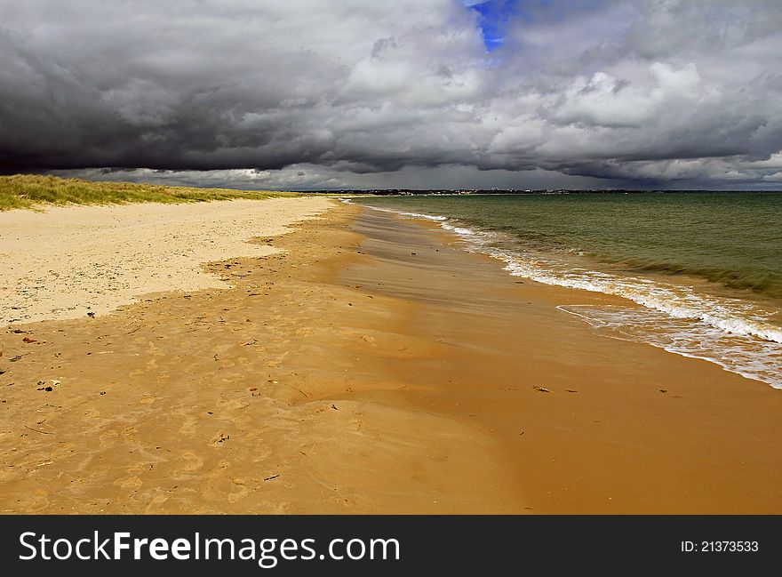 Studland Bay with threatening Storm Clouds over Poole Harbour, Dorset Coast, England. Studland Bay with threatening Storm Clouds over Poole Harbour, Dorset Coast, England