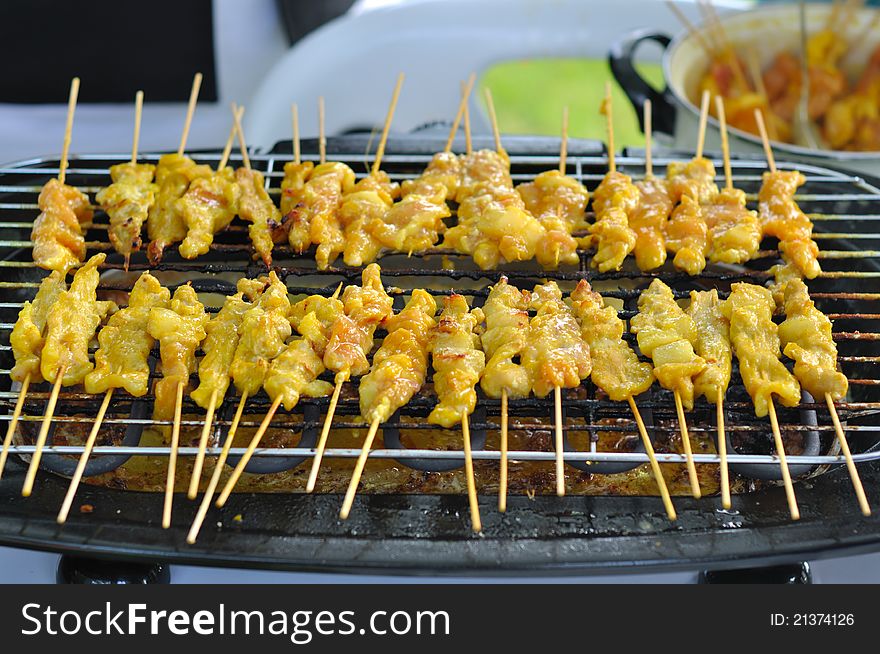 Yellow grilled pork barbecue in Thai style