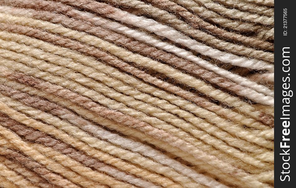 Woolen yarn closeup, abstract background