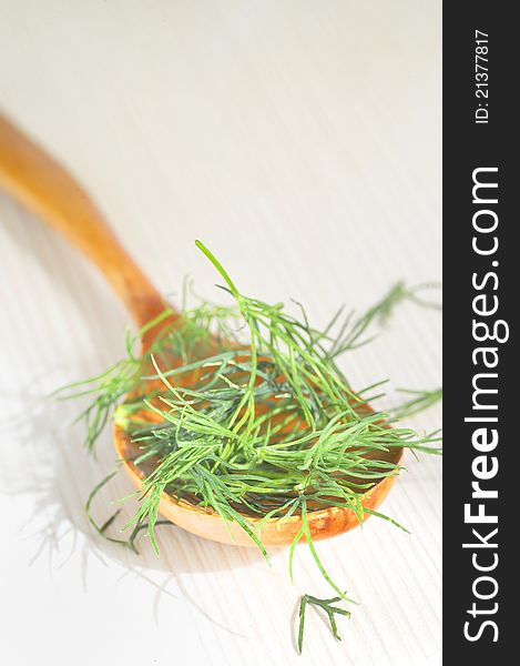 Details of Wooden spoon with dill