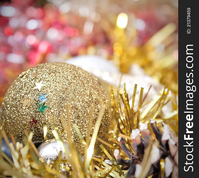 Christmas decoration with shiny glare over light background