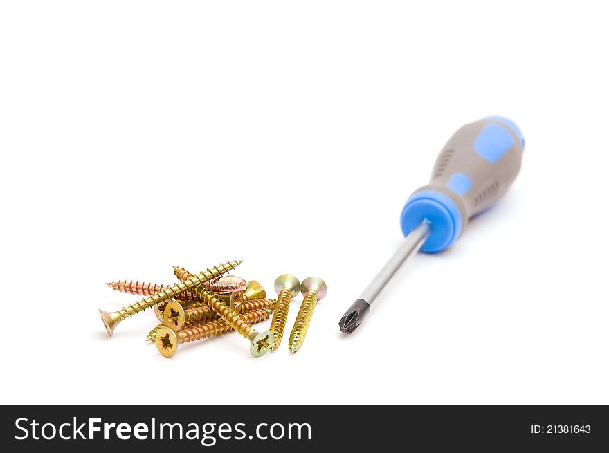 Screwdriver And Yellow Screws