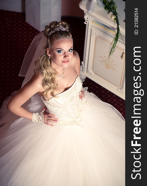 Beautiful young bride in the hotel room. Beautiful young bride in the hotel room