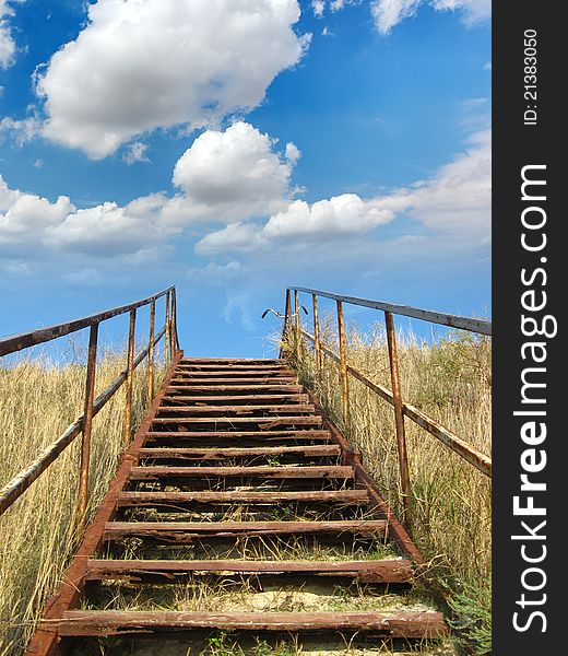 Staircase leading to the sky in which clouds float. Staircase leading to the sky in which clouds float