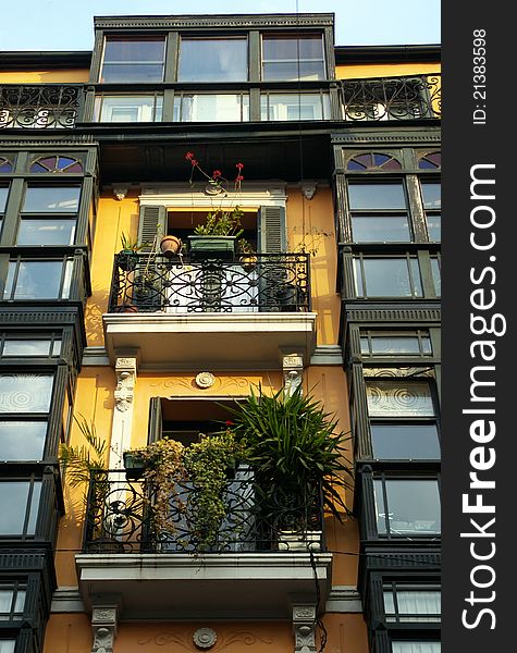 Colourful Facades and balconies with plants and flowers in Bilbao, Spain. Colourful Facades and balconies with plants and flowers in Bilbao, Spain.