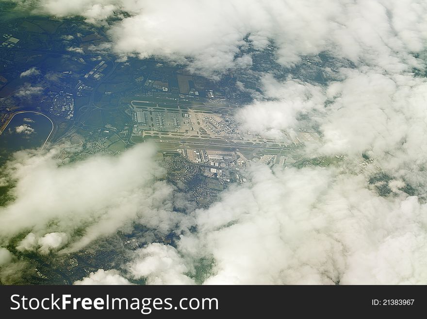 A photo of world seen from above through the clouds. A photo of world seen from above through the clouds